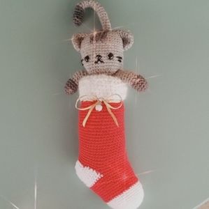 Cat in Christmas socks Amigurumi